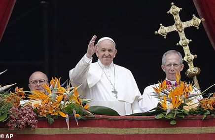 Pope Francis waving to large crowd at St. Peter Square.