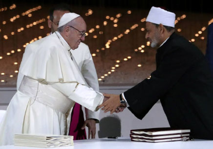Pope Francis shaking hands with Ahmed el-Tayeb, the Grand Imam of Al-Azhar at the Global Conference of Human Fraternity on February 4, 2019.